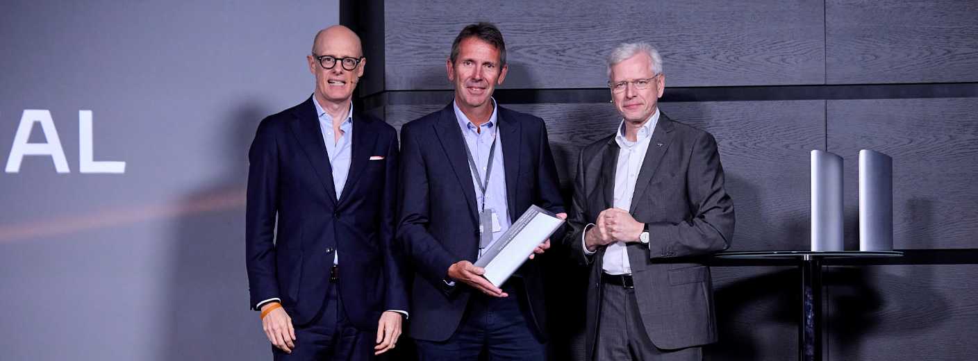 PSM CEO Mark Barge proudly accepting the Supplier Excellence award from McLaren CEO, Michael Leiters and Chief Procurement officer, Jorg Laser.